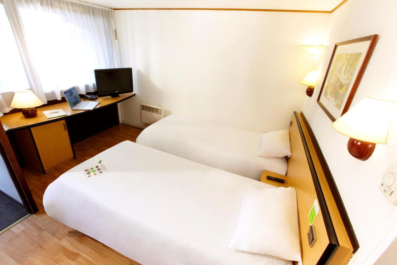 Chambre Triple avec 2 Lits Simples et 1 Lit d'Appoint