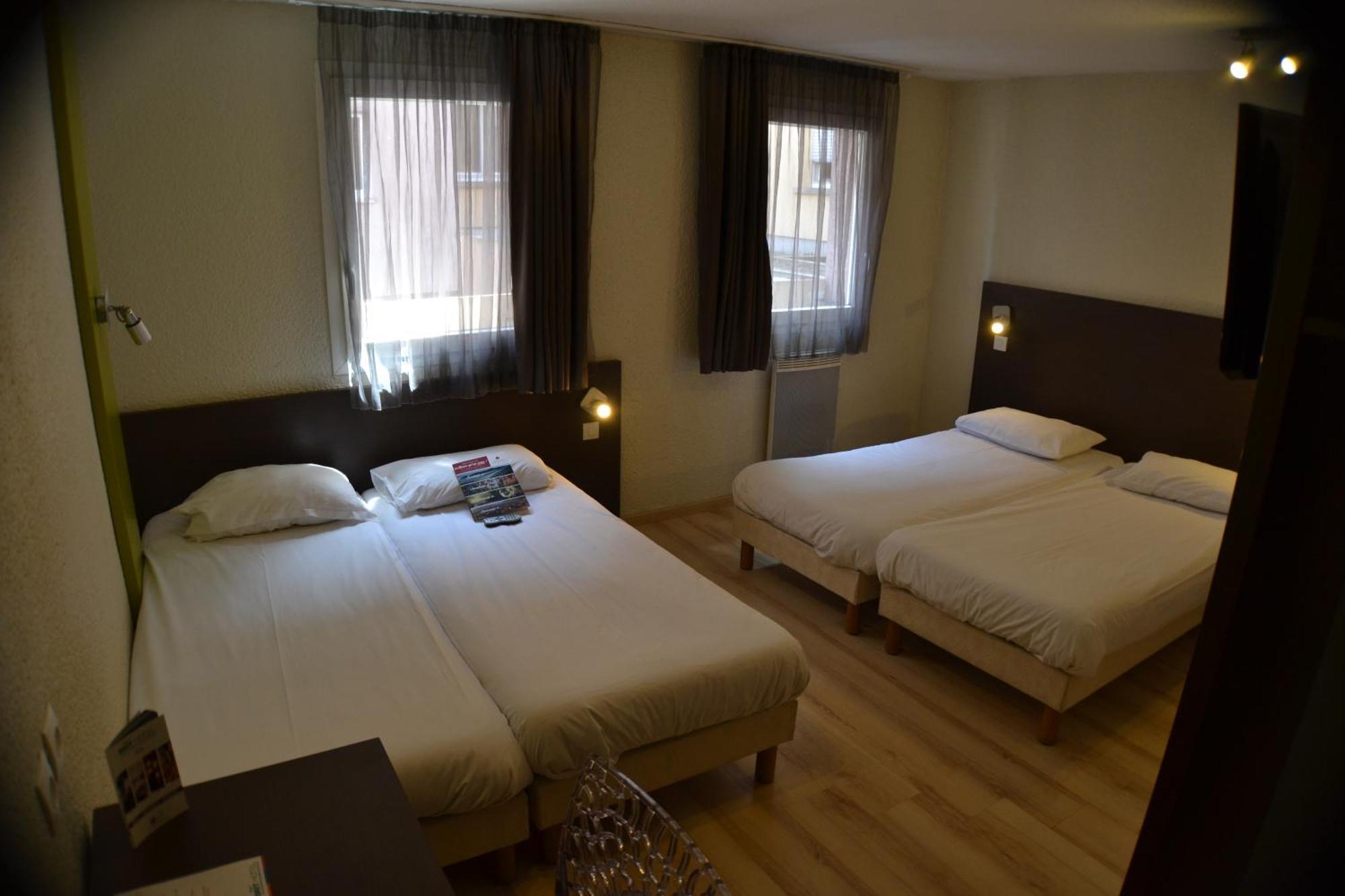 Habitación Cuádruple - 4 camas individuales