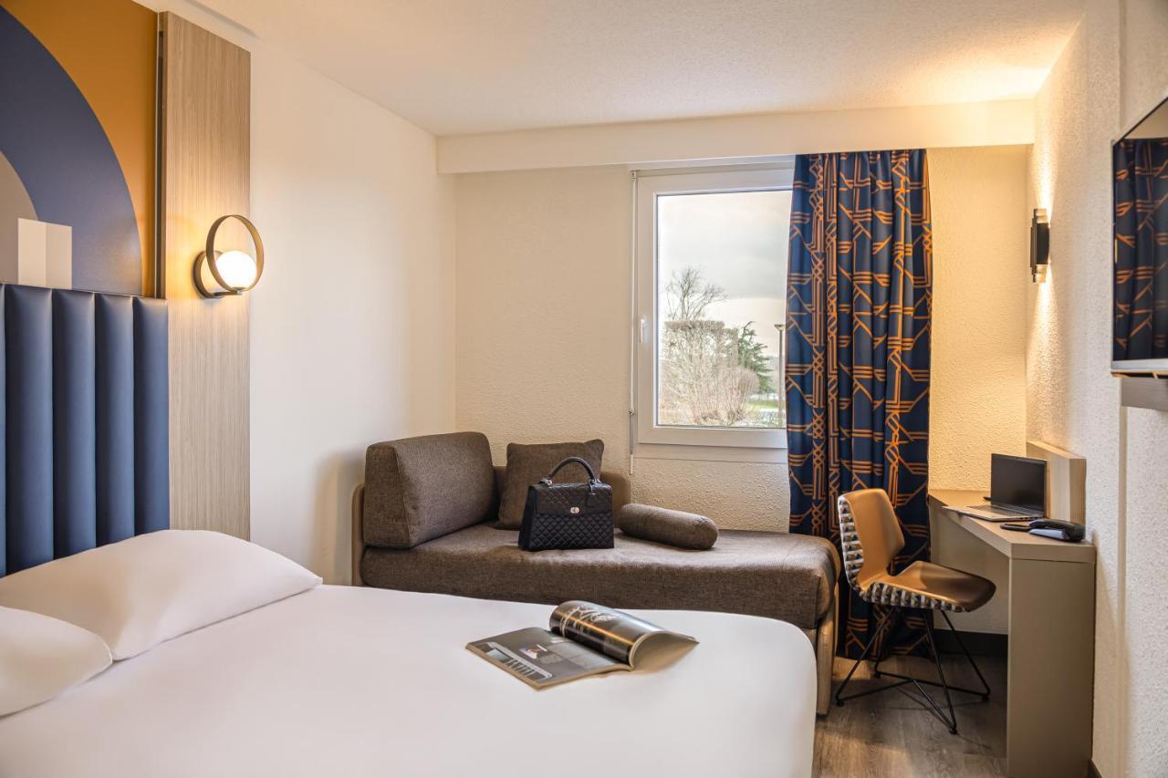 Family Room with One Double Bed and One Sofa