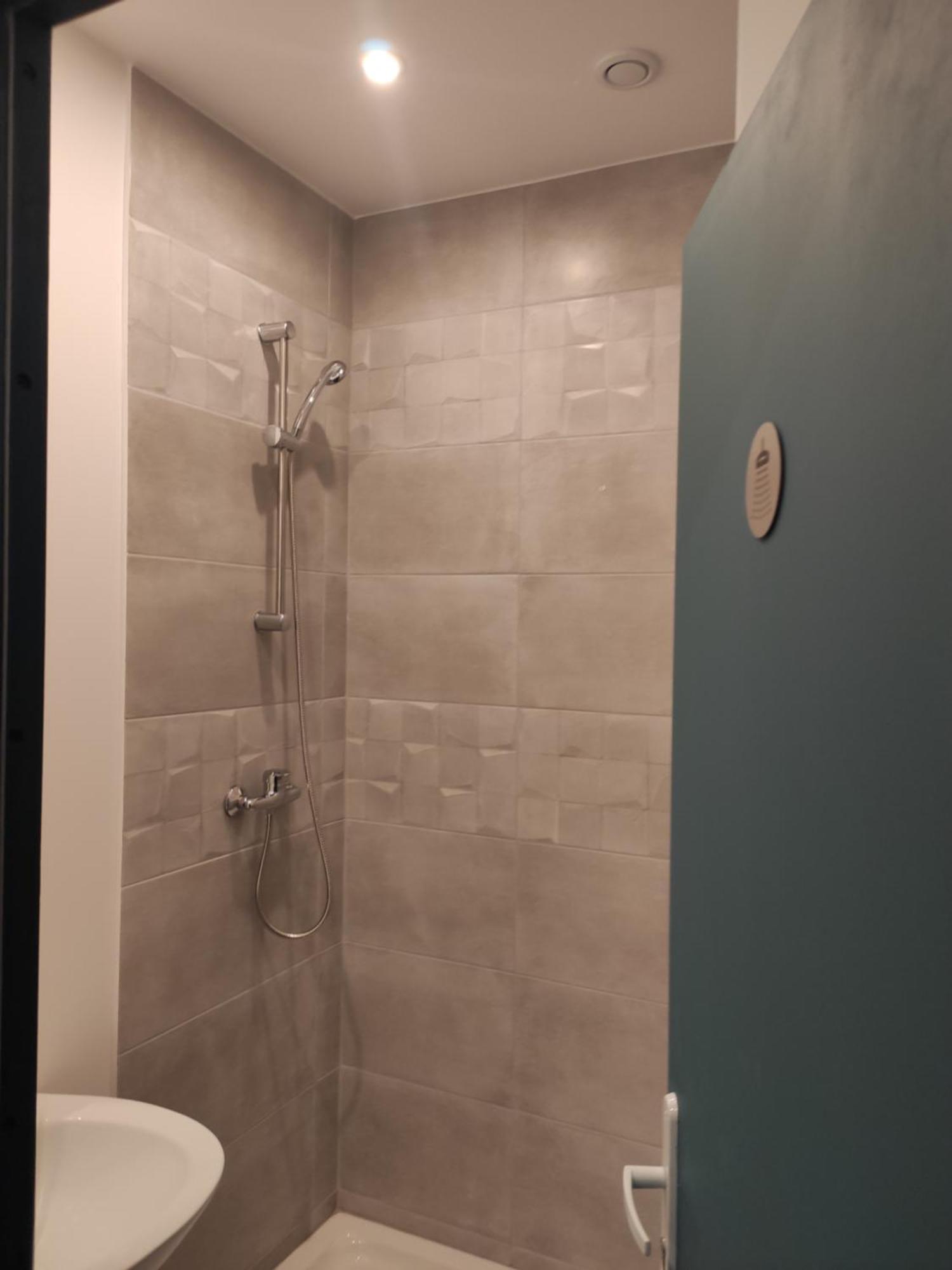 Single Room Shared Shower Toilet
