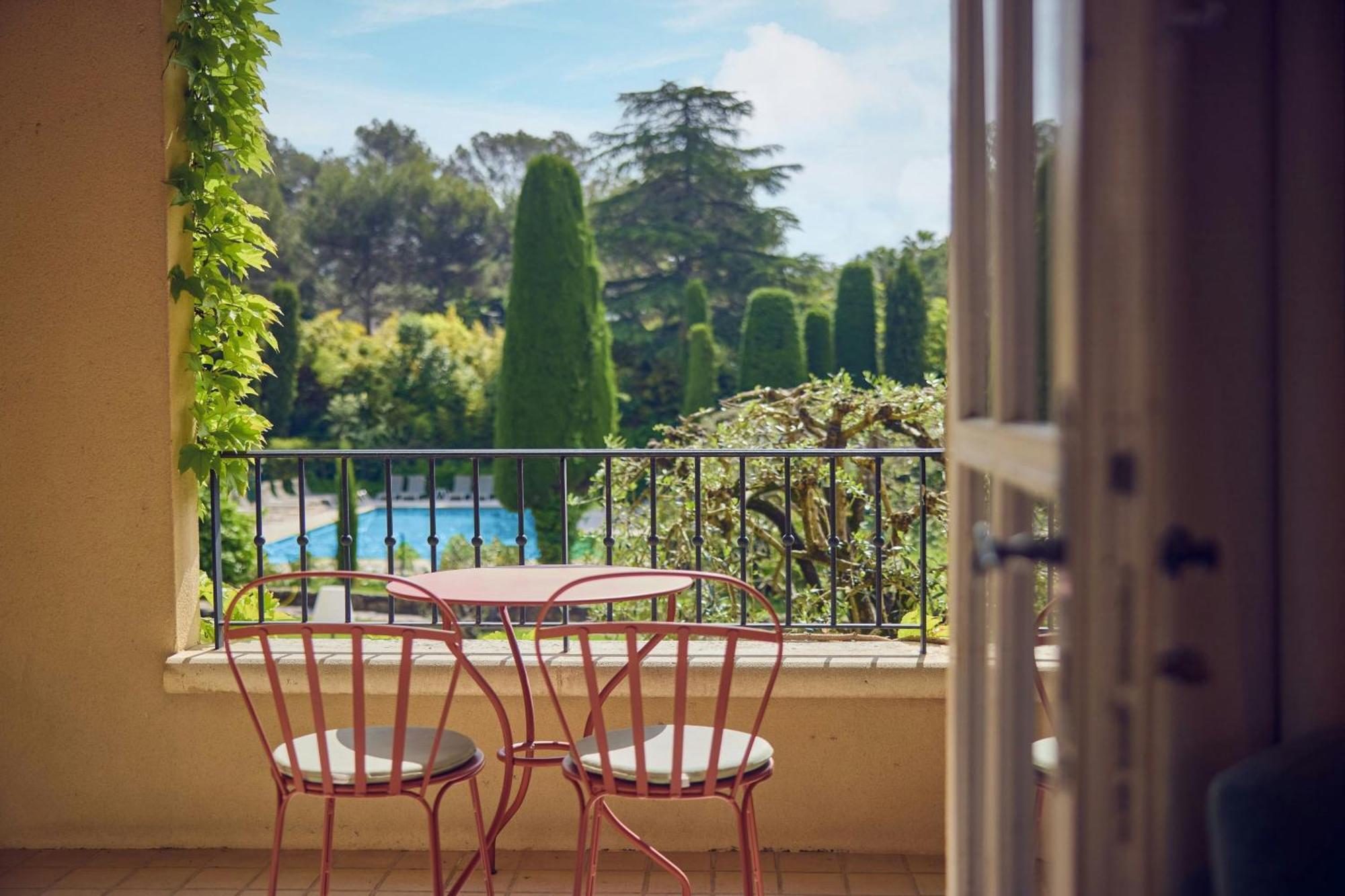 Suite Junior King avec canapé-lit, balcon et vue sur le jardin