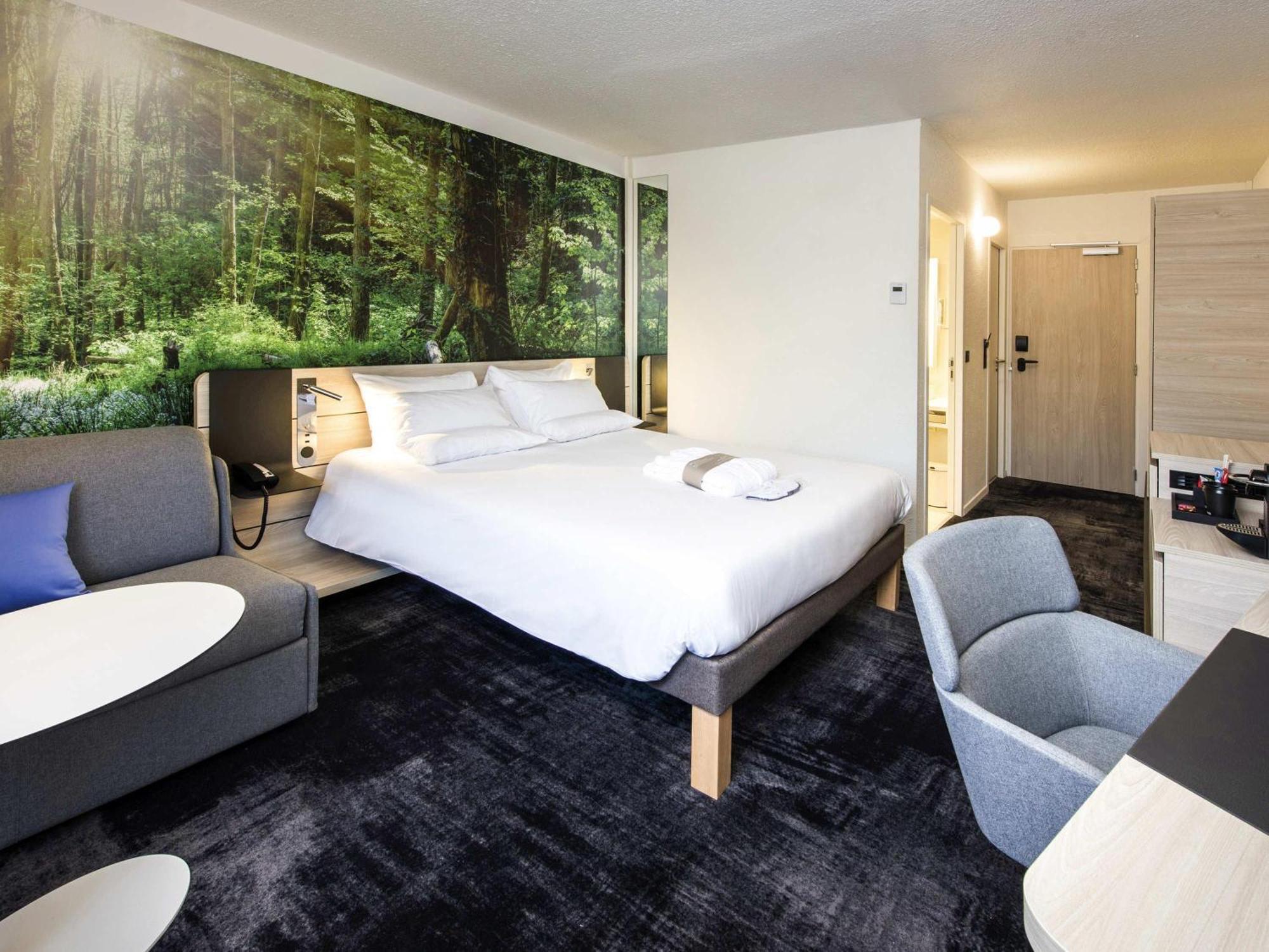 Superior Zimmer mit Queensize-Bett und Sofa