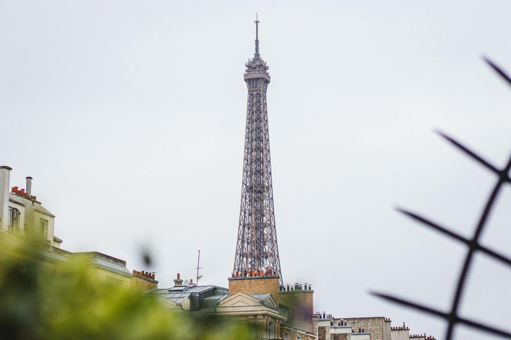 Quarto Executivo com Vista da Torre Eiffel