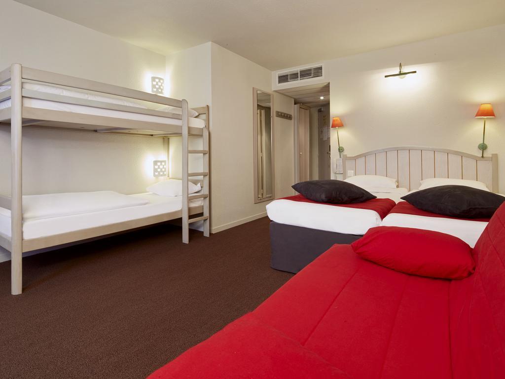 Habitación Doble Estándar - 1 sofá cama y 2 literas
