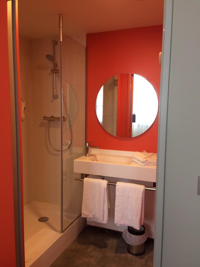 Standard Room with double bed and sofa
