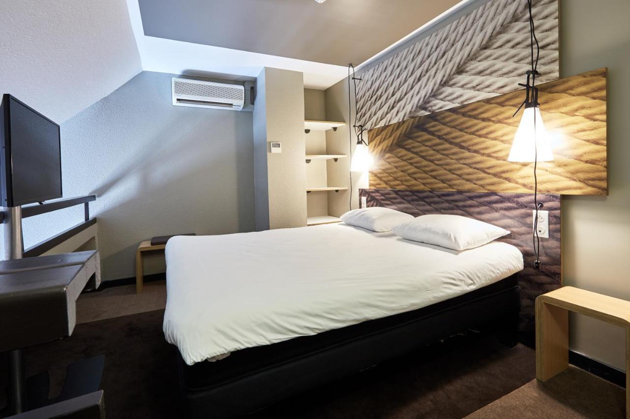 Habitación Dúplex con balcón - 1 cama doble y 2 camas individuales